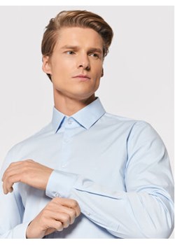 Calvin Klein Koszula Poplin K10K108229 Niebieski Slim Fit ze sklepu MODIVO w kategorii Koszule męskie - zdjęcie 177142887