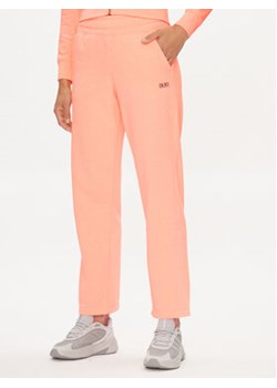 DKNY Sport Spodnie dresowe DP3P3406 Pomarańczowy Wide Leg ze sklepu MODIVO w kategorii Spodnie damskie - zdjęcie 177223237