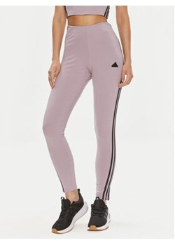 adidas Legginsy Future Icons 3-Stripes IS3611 Fioletowy Slim Fit ze sklepu MODIVO w kategorii Spodnie damskie - zdjęcie 177247337