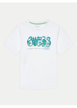 Guess T-Shirt L4YI20 K8HM4 Biały Regular Fit ze sklepu MODIVO w kategorii T-shirty chłopięce - zdjęcie 177358705