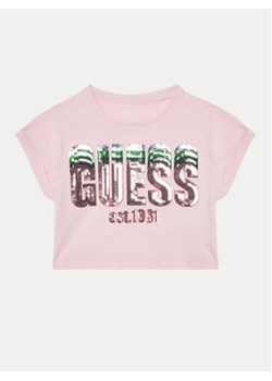 Guess T-Shirt J5RI10 K8HM4 Różowy Regular Fit ze sklepu MODIVO w kategorii Bluzki dziewczęce - zdjęcie 177436809