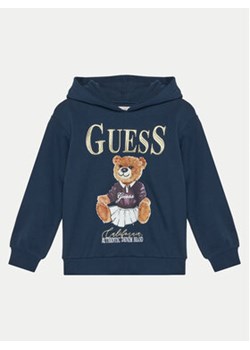 Guess Bluza J5RQ04 KAD74 Błękitny Regular Fit ze sklepu MODIVO w kategorii Bluzy chłopięce - zdjęcie 177443486