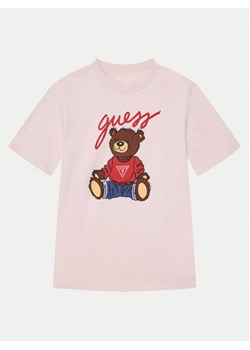 Guess T-Shirt H4BJ06 I3Z14 Różowy Regular Fit ze sklepu MODIVO w kategorii Bluzki dziewczęce - zdjęcie 177504619