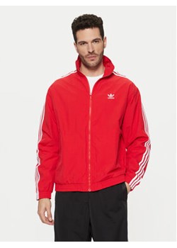 adidas Bluza adicolor Firebird IT2495 Czerwony Loose Fit ze sklepu MODIVO w kategorii Bluzy męskie - zdjęcie 177597377