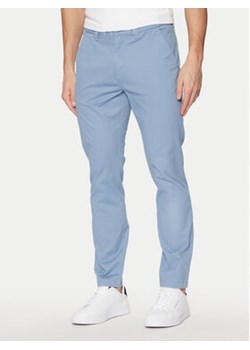 Tommy Jeans Chinosy Austin DM0DM20282 Niebieski Slim Fit ze sklepu MODIVO w kategorii Spodnie męskie - zdjęcie 177597849