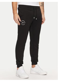 Jack&Jones Spodnie dresowe Gordon 12268442 Czarny Regular Fit ze sklepu MODIVO w kategorii Spodnie męskie - zdjęcie 177602759