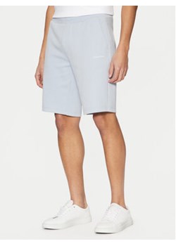 Calvin Klein Szorty sportowe Micro Logo K10K111208 Niebieski Regular Fit ze sklepu MODIVO w kategorii Spodenki męskie - zdjęcie 177886517