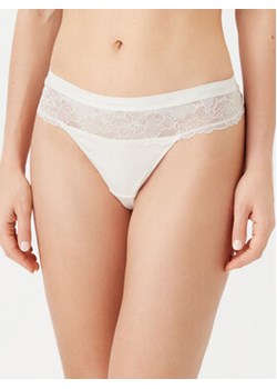 Calvin Klein Underwear Stringi 000QF7980E Écru ze sklepu MODIVO w kategorii Majtki damskie - zdjęcie 178065095