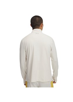 Męski longsleeve do biegania Under Armour UA Trail Run Quarter Zip - beżowy ze sklepu Sportstylestory.com w kategorii T-shirty męskie - zdjęcie 178107659