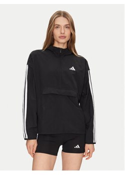 adidas Wiatrówka Essentials 3-Stripes JE1312 Czarny Regular Fit ze sklepu MODIVO w kategorii Kurtki damskie - zdjęcie 178118749