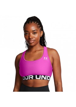 Biustonosz treningowy Under Armour UA Hg Authentics Mid Branded - różowy ze sklepu Sportstylestory.com w kategorii Biustonosze - zdjęcie 178170198