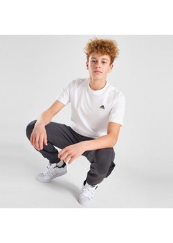 ADIDAS T-SHIRT CORE LGO T WHT B ze sklepu JD Sports  w kategorii T-shirty chłopięce - zdjęcie 178190297