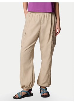 Columbia Spodnie outdoor Sandier™ Parachute Pant 2119061 Beżowy Relaxed Fit ze sklepu MODIVO w kategorii Spodnie damskie - zdjęcie 178427316