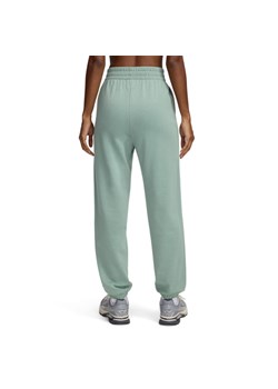 Damskie spodnie dresowe Under Armour UA Rival Terry Jogger - zielone ze sklepu Sportstylestory.com w kategorii Spodnie damskie - zdjęcie 178529759