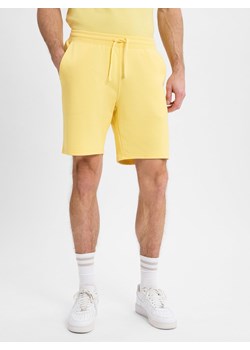 Tommy Hilfiger Spodenki - Essential Terry Sweatshort Mężczyźni Bawełna żółty jednolity ze sklepu vangraaf w kategorii Spodenki męskie - zdjęcie 178537597