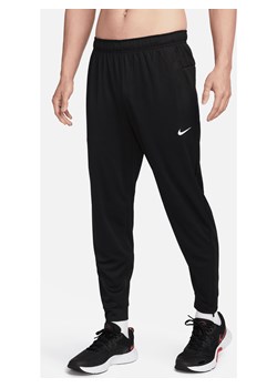 Męskie uniwersalne spodnie ze zwężanymi nogawkami Dri-FIT Nike Totality - Czerń ze sklepu Nike poland w kategorii Spodnie męskie - zdjęcie 178602447