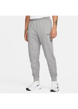 Męskie zwężane spodnie do fitnessu Therma-FIT Nike Therma - Szary ze sklepu Nike poland w kategorii Spodnie męskie - zdjęcie 178605008