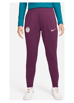 Damskie spodnie piłkarskie z dzianiny Nike Dri-FIT Paris Saint-Germain Strike - Czerwony ze sklepu Nike poland w kategorii Spodnie damskie - zdjęcie 178606046