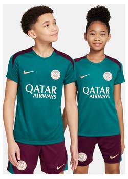 Dzianinowa koszulka piłkarska z krótkim rękawem dla dużych dzieci Nike Dri-FIT Paris Saint-Germain Strike - Zieleń ze sklepu Nike poland w kategorii T-shirty chłopięce - zdjęcie 178607387