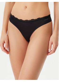 Calvin Klein Underwear Stringi LV00QD5270 Czarny ze sklepu MODIVO w kategorii Majtki damskie - zdjęcie 178655538