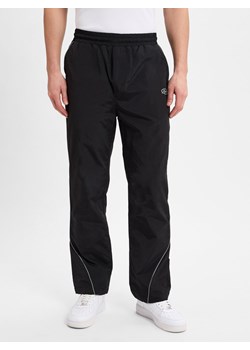 PEGADOR Męskie spodnie do biegania - Mercer Track Pants Mężczyźni Sztuczne włókno czarny jednolity ze sklepu vangraaf w kategorii Spodnie męskie - zdjęcie 178672917