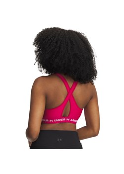 Biustonosz treningowy Under Armour Crossback Mid Bra - różowy ze sklepu Sportstylestory.com w kategorii Biustonosze - zdjęcie 178683838