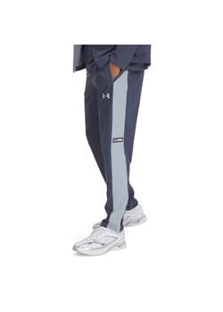 Męskie spodnie treningowe Under Armour UA Woven Utility Pants - szare ze sklepu Sportstylestory.com w kategorii Spodnie męskie - zdjęcie 178911846
