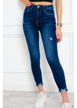 SPODNIE JEANSOWE SKINNY Z PRZETARCIAMI- CIEMNY JEANS ze sklepu olika.com.pl w kategorii Jeansy damskie - zdjęcie 178967339