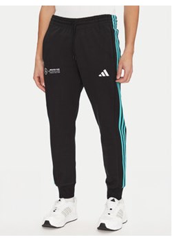 adidas Spodnie dresowe Mercedes - AMG Petronas Formula One Team DNA JV5379 Czarny Regular Fit ze sklepu MODIVO w kategorii Spodnie męskie - zdjęcie 179032819