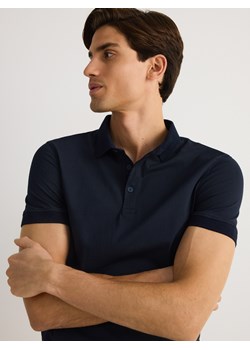 Reserved - Bawełniana koszulka polo slim - granatowy ze sklepu Reserved w kategorii T-shirty męskie - zdjęcie 179101416