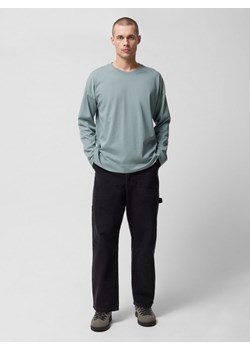 Męskie jeansy Outhorn OTHWSS24TTROM631 - czarne ze sklepu Sportstylestory.com w kategorii Jeansy męskie - zdjęcie 179147336