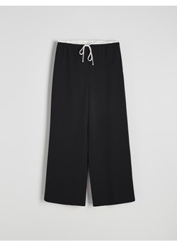 Reserved - Spodnie jogger - czarny - id: 2565I-99X - marki Reserved - 179335886 Reserved - Spodnie jogger - czarny ze sklepu Reserved w kategorii Spodnie damskie - zdjęcie 179335886