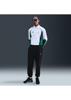 Męskie spodnie ze szczotkowanej dzianiny ze ściągaczami Nike Club - Czerń ze sklepu Nike poland w kategorii Spodnie męskie - zdjęcie 179442879