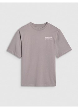 Dziewczęcy t-shirt oversize z nadrukiem 4F 4FJRSS25TTSHF2586 - beżowy ze sklepu Sportstylestory.com w kategorii Bluzki dziewczęce - zdjęcie 179536315