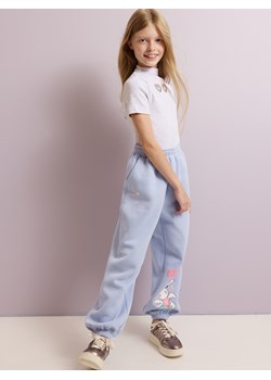 Reserved - Spodnie dresowe z nadrukiem - jasnoniebieski ze sklepu Reserved w kategorii Spodnie dziewczęce - zdjęcie 179632889