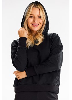 Bluza dresowa z kieszenią kangurek - czarna ze sklepu Cudmoda w kategorii Bluzy damskie - zdjęcie 179651565