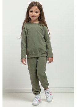 Spodnie dresowe typu jogger dla dziewczynki - zielone ze sklepu Cudmoda w kategorii Spodnie dziewczęce - zdjęcie 179651969