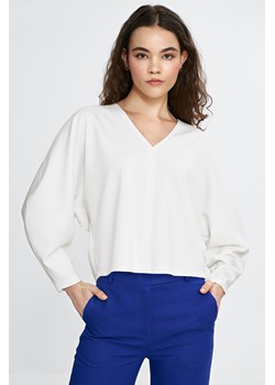 Bluzka oversize z dekoltem V - ecru ze sklepu Cudmoda w kategorii Bluzki damskie - zdjęcie 179654839