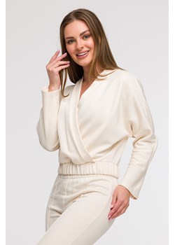 Bluza z kopertowym dekoltem - waniliowa ze sklepu Cudmoda w kategorii Bluzy damskie - zdjęcie 179654878