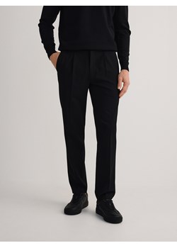 Reserved - Spodnie slim fit z kantem - czarny ze sklepu Reserved w kategorii Spodnie męskie - zdjęcie 179731089