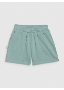 Dziewczęce spodenki dresowe 4F 4FJWSS25TSHOF470 - turkusowe ze sklepu Sportstylestory.com w kategorii Spodenki dziewczęce - zdjęcie 179733469