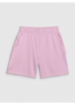Dziewczęce spodnie dresowe 4F 4FJWSS25TSHOF483 - różowe ze sklepu Sportstylestory.com w kategorii Spodnie dziewczęce - zdjęcie 179754985