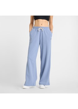 Spodnie damskie New Balance WP51503DUS – niebieskie ze sklepu New Balance Poland w kategorii Spodnie damskie - zdjęcie 180390736