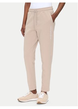 EA7 Emporio Armani Spodnie dresowe 7W000489 AF12951 U6155 Beżowy Regular Fit ze sklepu MODIVO w kategorii Spodnie damskie - zdjęcie 180404498