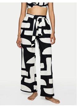 Triumph Spodnie piżamowe Summer 10222571 Czarny Relaxed Fit ze sklepu MODIVO w kategorii Piżamy damskie - zdjęcie 180421295