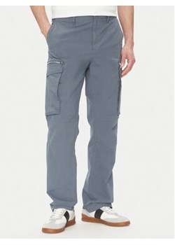 Michael Kors Spodnie materiałowe CS5304LHBY Niebieski Straight Leg ze sklepu MODIVO w kategorii Spodnie męskie - zdjęcie 180421549