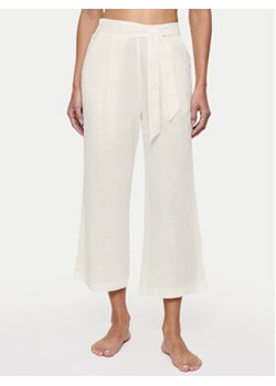 Triumph Spodnie piżamowe Summer 10222571 Écru Relaxed Fit ze sklepu MODIVO w kategorii Piżamy damskie - zdjęcie 180426058