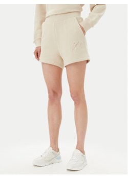 Armani Exchange Szorty sportowe XW000598 AF11852 U1092 Beżowy Regular Fit ze sklepu MODIVO w kategorii Szorty - zdjęcie 180434335