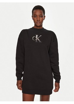 Calvin Klein Jeans Sukienka dzianinowa J20J224834 Czarny Relaxed Fit - id: 0000304411892 - marki Calvin Klein - 181032206 Calvin Klein Jeans Sukienka dzianinowa J20J224834 Czarny Relaxed Fit ze sklepu MODIVO w kategorii Sukienki - zdjęcie 181032206