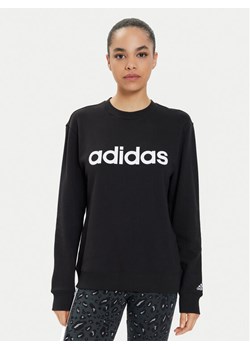 adidas Bluza Essentials Linear IC6878 Czarny Regular Fit ze sklepu MODIVO w kategorii Bluzy damskie - zdjęcie 181033687